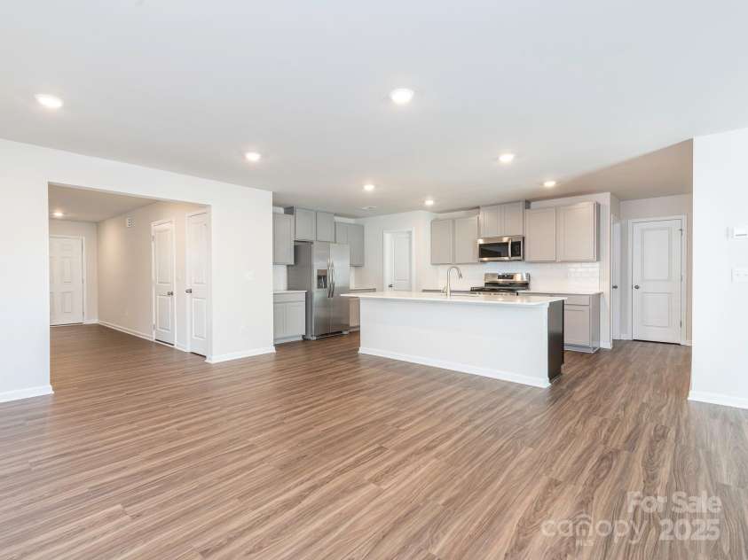 11019 Daisy Court, Charlotte, NC 28262.  MLS# CAR4255718, YatesRealty ID 12476. Open Living Dining & Kitchen