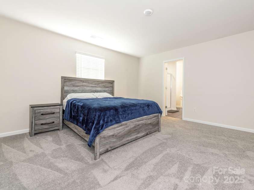 11019 Daisy Court, Charlotte, NC 28262.  MLS# CAR4255718, YatesRealty ID 12476. Primary Bedroom upstairs