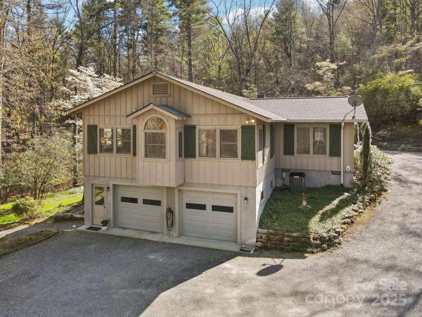 798 Evans Road, Hendersonville, NC 28739.  MLS# CAR4249023, YatesRealty ID 12477. Electric car charger at front of house