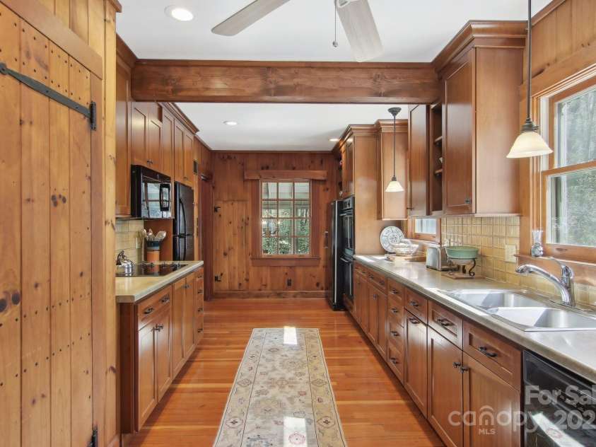 798 Evans Road, Hendersonville, NC 28739.  MLS# CAR4249023, YatesRealty ID 12477. Kitchen w/custom cherry cabinets and tile backsplash