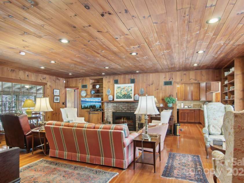 798 Evans Road, Hendersonville, NC 28739.  MLS# CAR4249023, YatesRealty ID 12477. Living room, dining room, kitchen & entry have Douglas fir wood floors