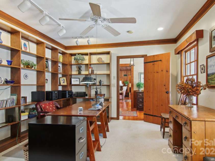 798 Evans Road, Hendersonville, NC 28739.  MLS# CAR4249023, YatesRealty ID 12477. Study w/hand crafted bookshelves