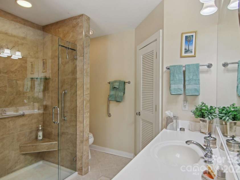 798 Evans Road, Hendersonville, NC 28739.  MLS# CAR4249023, YatesRealty ID 12477. Tiled showers