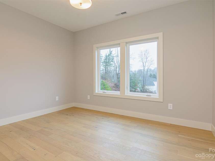 33 Course Drive, Etowah, NC 28729.  MLS# CAR4069124, YatesRealty ID 1248. Both one and two lower level bedrooms have large windows