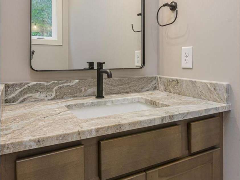 33 Course Drive, Etowah, NC 28729.  MLS# CAR4069124, YatesRealty ID 1248. Guest bathroom in main living area granite counter tops