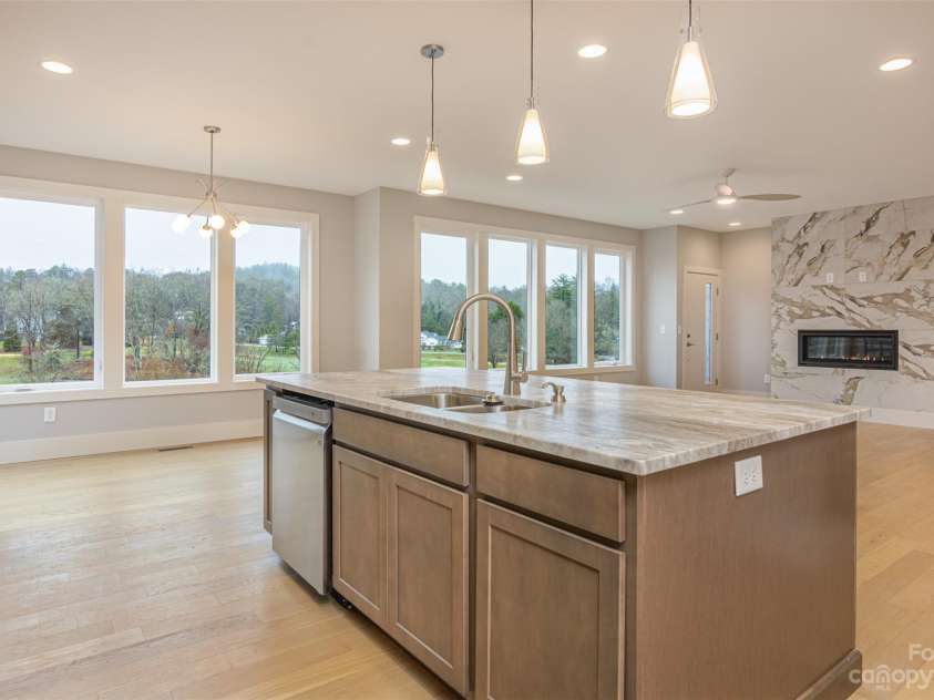 33 Course Drive, Etowah, NC 28729.  MLS# CAR4069124, YatesRealty ID 1248. Kitchen and dining windows