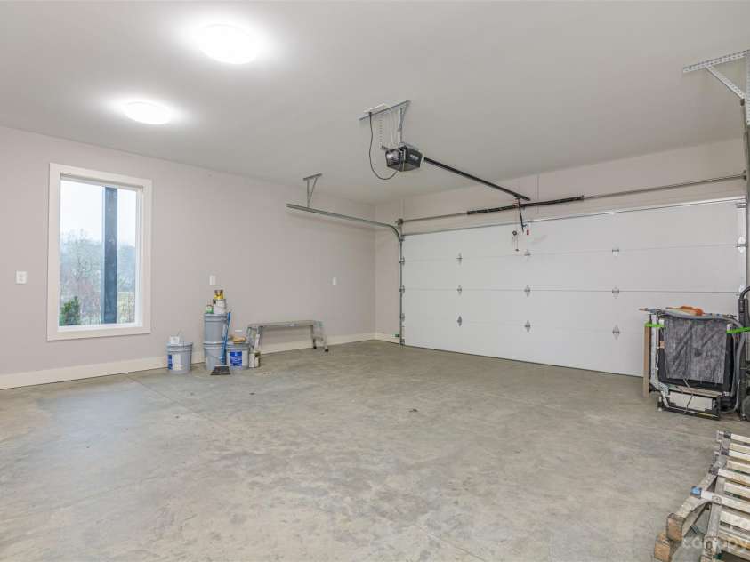 33 Course Drive, Etowah, NC 28729.  MLS# CAR4069124, YatesRealty ID 1248. Large two car garage