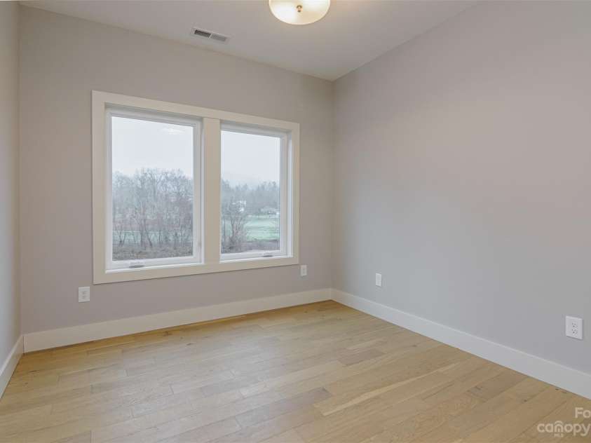 33 Course Drive, Etowah, NC 28729.  MLS# CAR4069124, YatesRealty ID 1248. Large window in lower level bedrooms