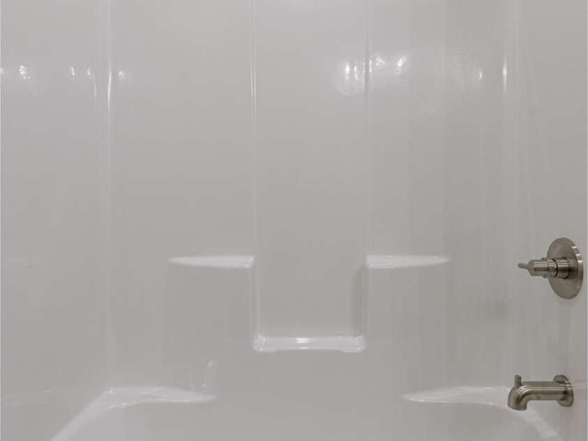 33 Course Drive, Etowah, NC 28729.  MLS# CAR4069124, YatesRealty ID 1248. Lower level bathroom with tub and shower