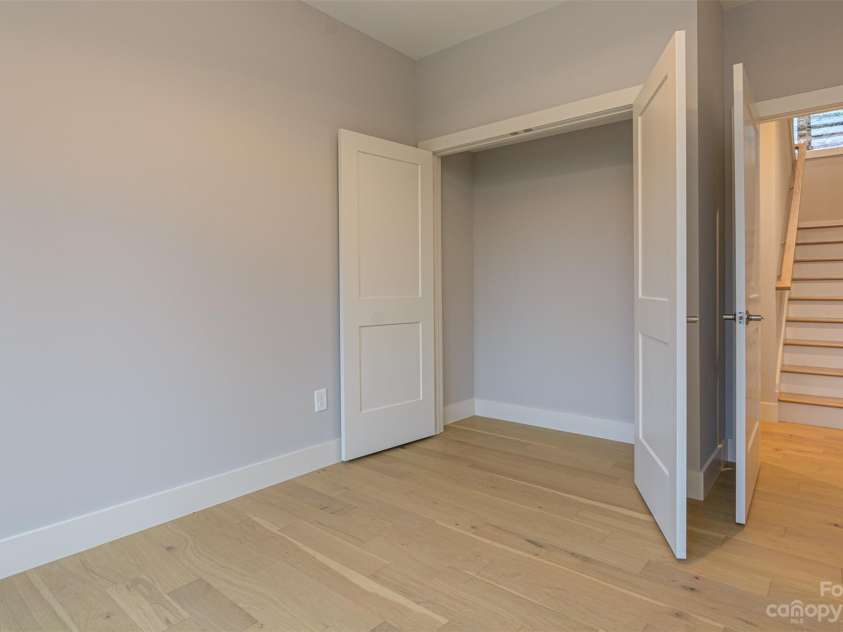 33 Course Drive, Etowah, NC 28729.  MLS# CAR4069124, YatesRealty ID 1248. Lower level bedroom number two