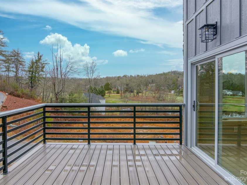 33 Course Drive, Etowah, NC 28729.  MLS# CAR4069124, YatesRealty ID 1248. Open deck, sliding glass doors to dining area