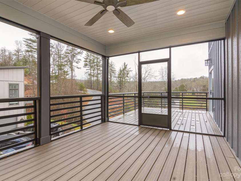 33 Course Drive, Etowah, NC 28729.  MLS# CAR4069124, YatesRealty ID 1248. Screen porch door leading to open deck