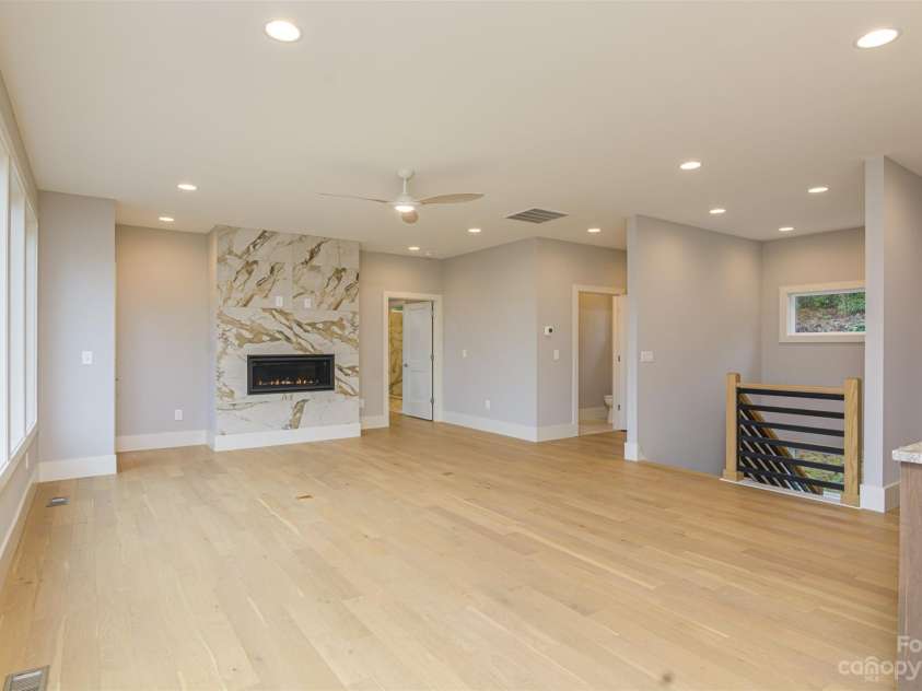 33 Course Drive, Etowah, NC 28729.  MLS# CAR4069124, YatesRealty ID 1248. View from dining area to living room