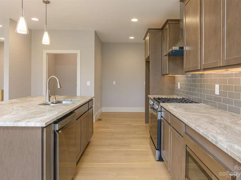 33 Course Drive, Etowah, NC 28729.  MLS# CAR4069124, YatesRealty ID 1248. View from kitchen of walk-in pantry