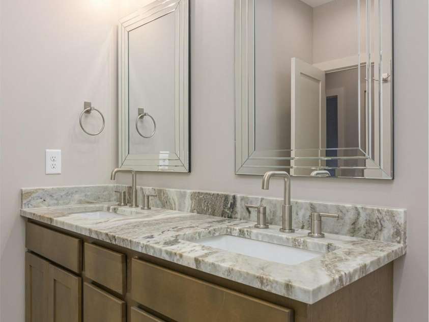 33 Course Drive, Etowah, NC 28729.  MLS# CAR4069124, YatesRealty ID 1248. View of lower level bathroom vanity