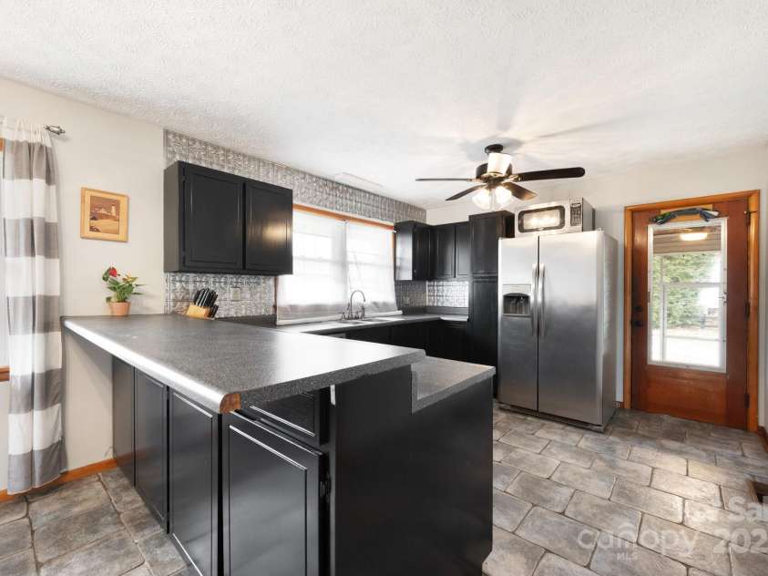 1134 Plott Creek Road, Waynesville, NC 28786.  MLS# CAR4221979, YatesRealty ID 12485. 