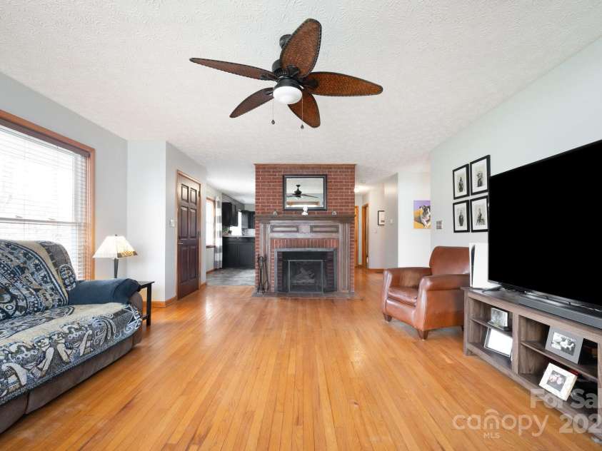 1134 Plott Creek Road, Waynesville, NC 28786.  MLS# CAR4221979, YatesRealty ID 12485. Original wood burning fireplace