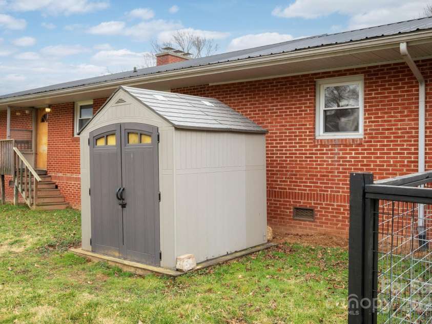 1134 Plott Creek Road, Waynesville, NC 28786.  MLS# CAR4221979, YatesRealty ID 12485. Shed may be included.