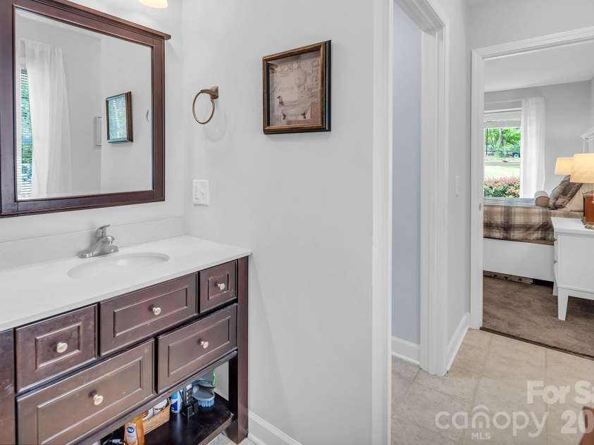 138 Uwharrie Court, Mount Gilead, NC 27306.  MLS# CAR4369880, YatesRealty ID 12486. Primary bathroom