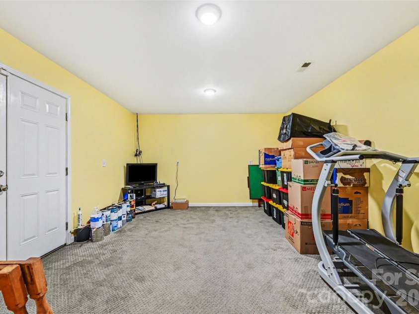391 Lone Tree Lane, Clover, SC 29710.  MLS# CAR4367245, YatesRealty ID 12487. Bonus/Flex space with double doors to the garage