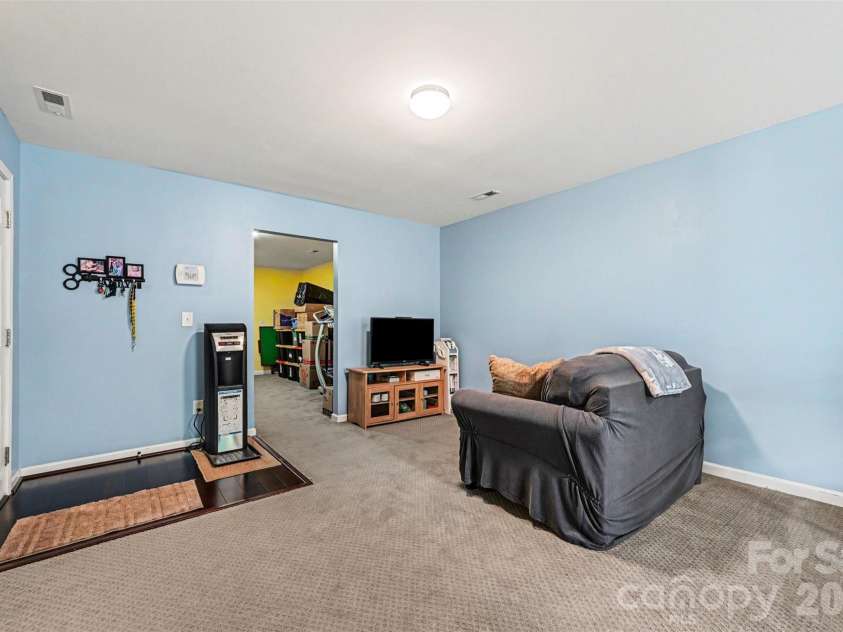 391 Lone Tree Lane, Clover, SC 29710.  MLS# CAR4367245, YatesRealty ID 12487. Downstairs living room
