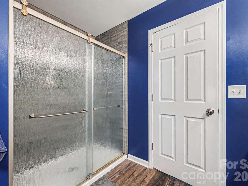 391 Lone Tree Lane, Clover, SC 29710.  MLS# CAR4367245, YatesRealty ID 12487. Large walk in tile shower