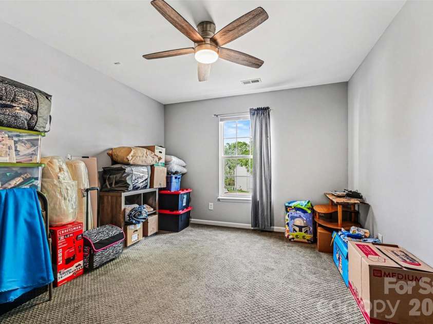 391 Lone Tree Lane, Clover, SC 29710.  MLS# CAR4367245, YatesRealty ID 12487. Spacious downstairs bedroom ensuite