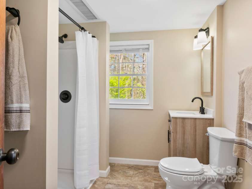 126 Big Oak Drive, Mills River, NC 28759.  MLS# CAR4240042, YatesRealty ID 12488. Lower level bathroom