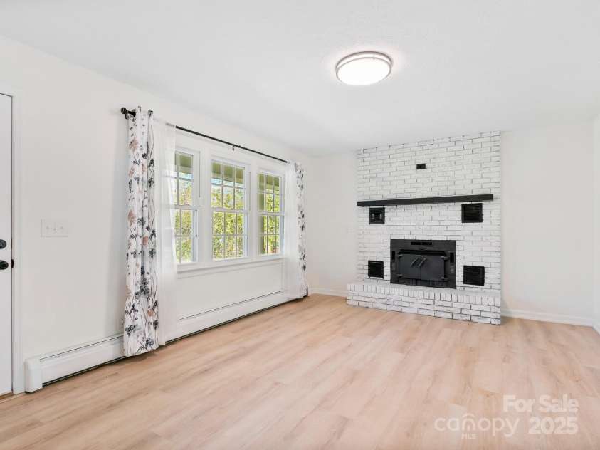 126 Big Oak Drive, Mills River, NC 28759.  MLS# CAR4240042, YatesRealty ID 12488. Woodburning fireplace