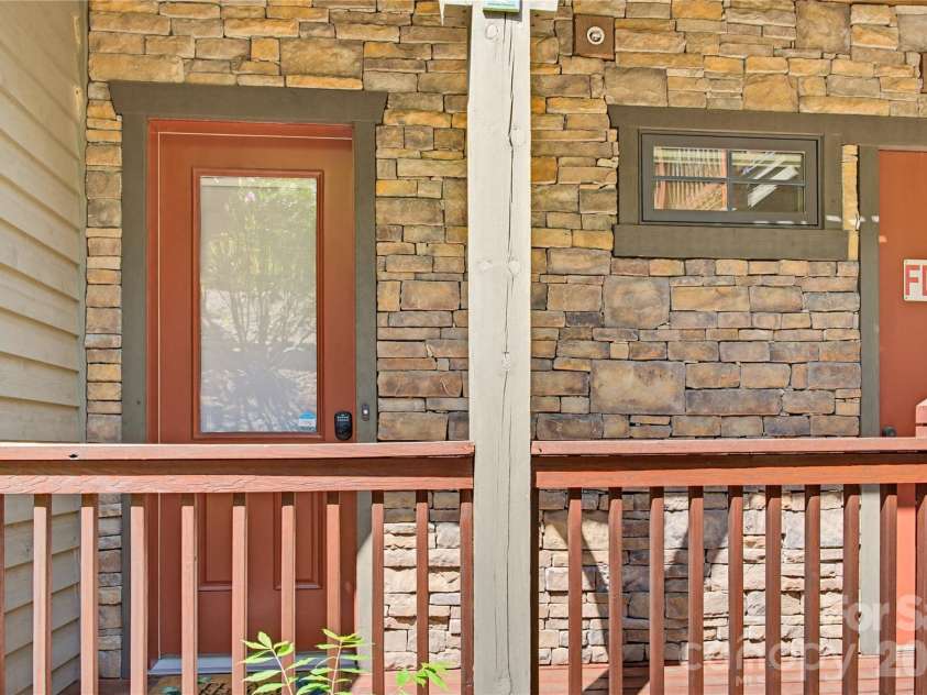 103 Southshore Drive, Tuckasegee, NC 28783.  MLS# CAR4380927, YatesRealty ID 12489. Bright entry door