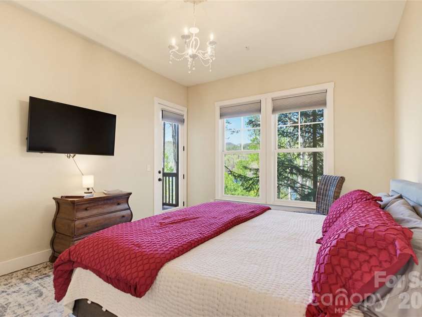 103 Southshore Drive, Tuckasegee, NC 28783.  MLS# CAR4380927, YatesRealty ID 12489. Large Primary Ensuite