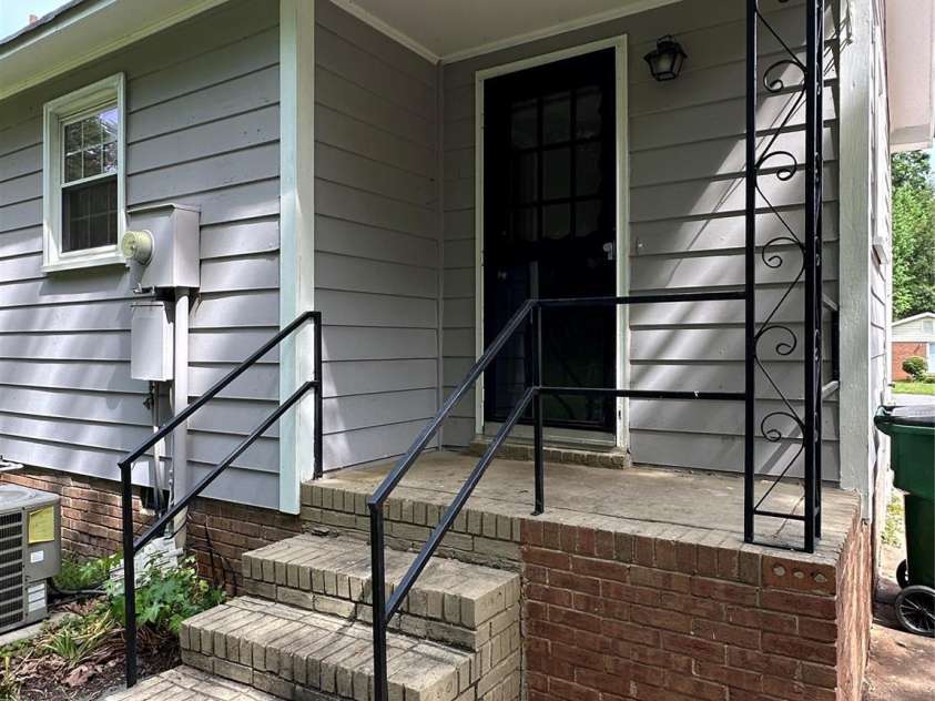5008 Delivau Drive, Charlotte, NC 28215.  MLS# CAR4250542, YatesRealty ID 12492. Back porch entrance