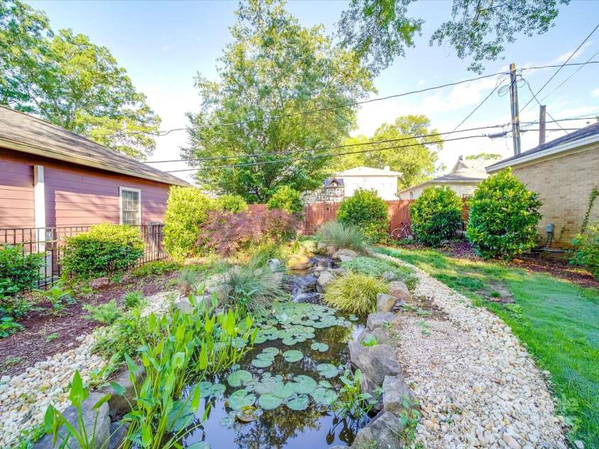 907 Edgewood Circle, Gastonia, NC 28052.  MLS# CAR4255642, YatesRealty ID 12494. Back Yard with Koi Pond