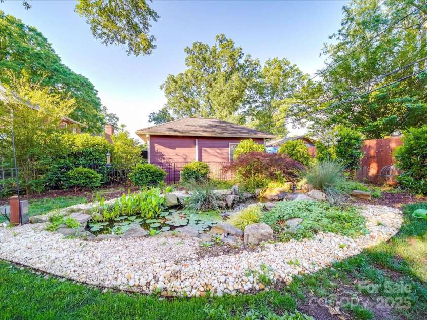 907 Edgewood Circle, Gastonia, NC 28052.  MLS# CAR4255642, YatesRealty ID 12494. Back Yard with Koi Pond