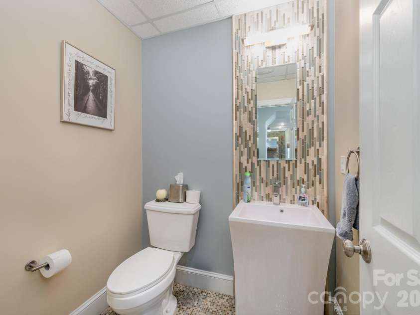 408 Johnsfield Road, Shelby, NC 28150.  MLS# CAR4369103, YatesRealty ID 12495. Half bath in the basement