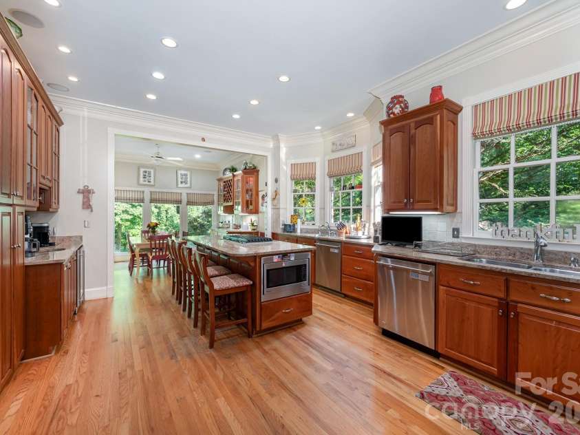 408 Johnsfield Road, Shelby, NC 28150.  MLS# CAR4369103, YatesRealty ID 12495. This CHEF'S KITCHEN has 3 sinks, two dishwashers,...
