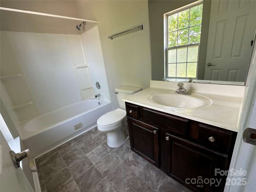 1300 Braveheart Lane, Charlotte, NC 28216.  MLS# CAR4255685, YatesRealty ID 12496. New vinyl flooring