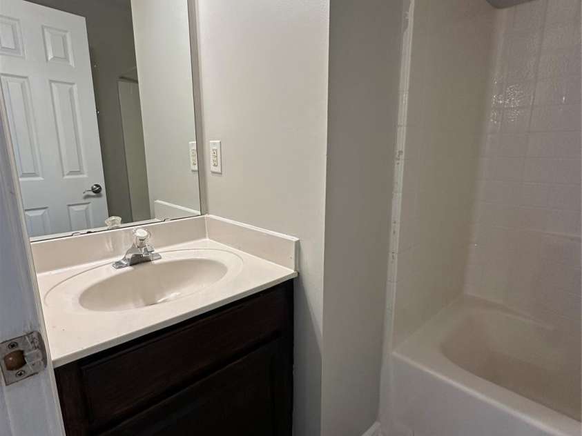 1300 Braveheart Lane, Charlotte, NC 28216.  MLS# CAR4255685, YatesRealty ID 12496. Second full bath on upper level