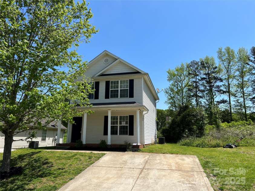 1300 Braveheart Lane, Charlotte, NC 28216.  MLS# CAR4255685, YatesRealty ID 12496. Two car off street parking