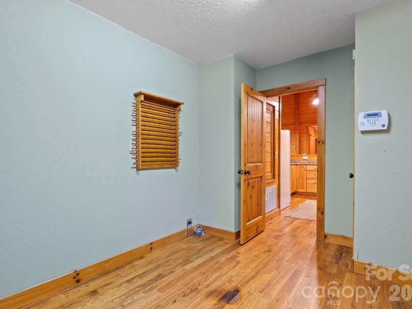 266 Rhododendron Drive, Saluda, NC 28773.  MLS# CAR4367080, YatesRealty ID 12496. Main level laundry room for easy access