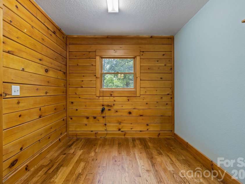 266 Rhododendron Drive, Saluda, NC 28773.  MLS# CAR4367080, YatesRealty ID 12496. Main level laundry room for easy access