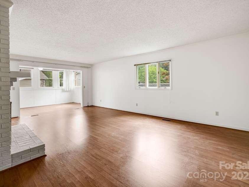 411 Britton Creek Drive, Hendersonville, NC 28791.  MLS# CAR4244943, YatesRealty ID 12498. 