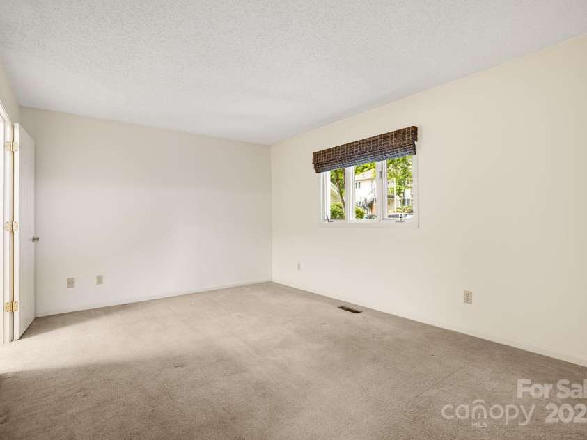 411 Britton Creek Drive, Hendersonville, NC 28791.  MLS# CAR4244943, YatesRealty ID 12498. 