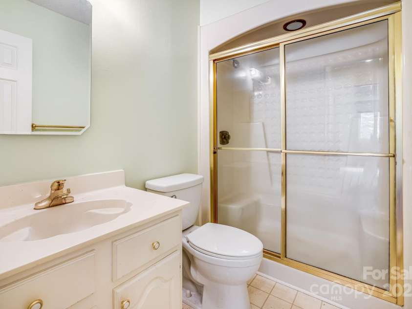 411 Britton Creek Drive, Hendersonville, NC 28791.  MLS# CAR4244943, YatesRealty ID 12498. 