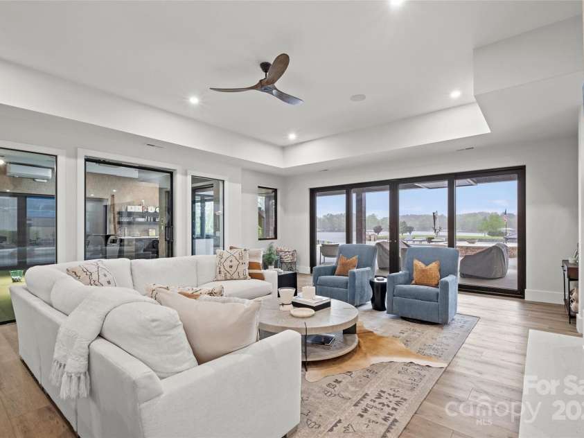 17235 Connor Quay Court, Cornelius, NC 28031.  MLS# CAR4291323, YatesRealty ID 1250. Lake Level Lounge 