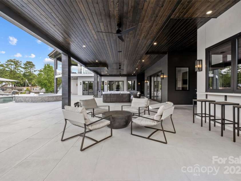 17235 Connor Quay Court, Cornelius, NC 28031.  MLS# CAR4291323, YatesRealty ID 1250. Poolside Lounge 