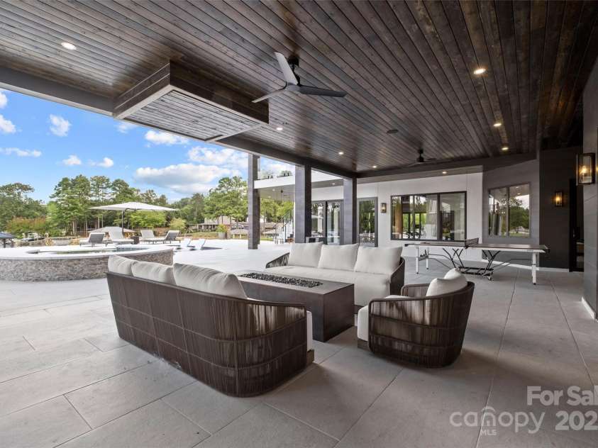 17235 Connor Quay Court, Cornelius, NC 28031.  MLS# CAR4291323, YatesRealty ID 1250. Poolside Lounge 
