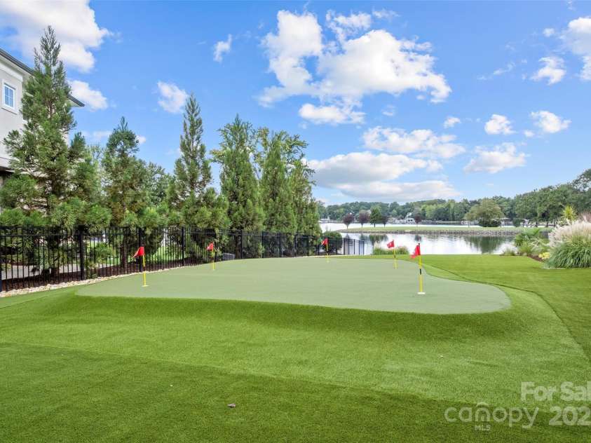 17235 Connor Quay Court, Cornelius, NC 28031.  MLS# CAR4291323, YatesRealty ID 1250. Putting Green 