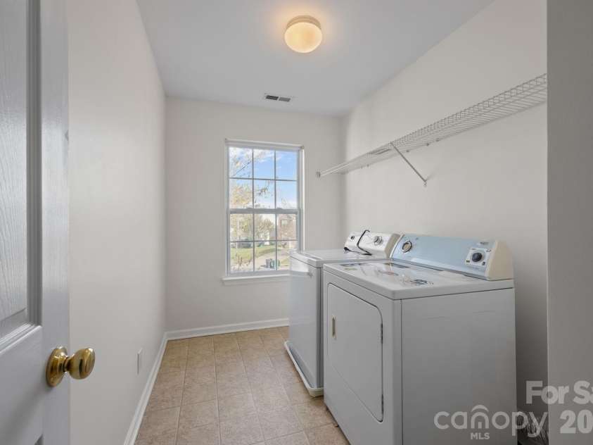 14307 O Casey Lane, Charlotte, NC 28213.  MLS# CAR4355673, YatesRealty ID 12501. Large Laundry Room Upper Level