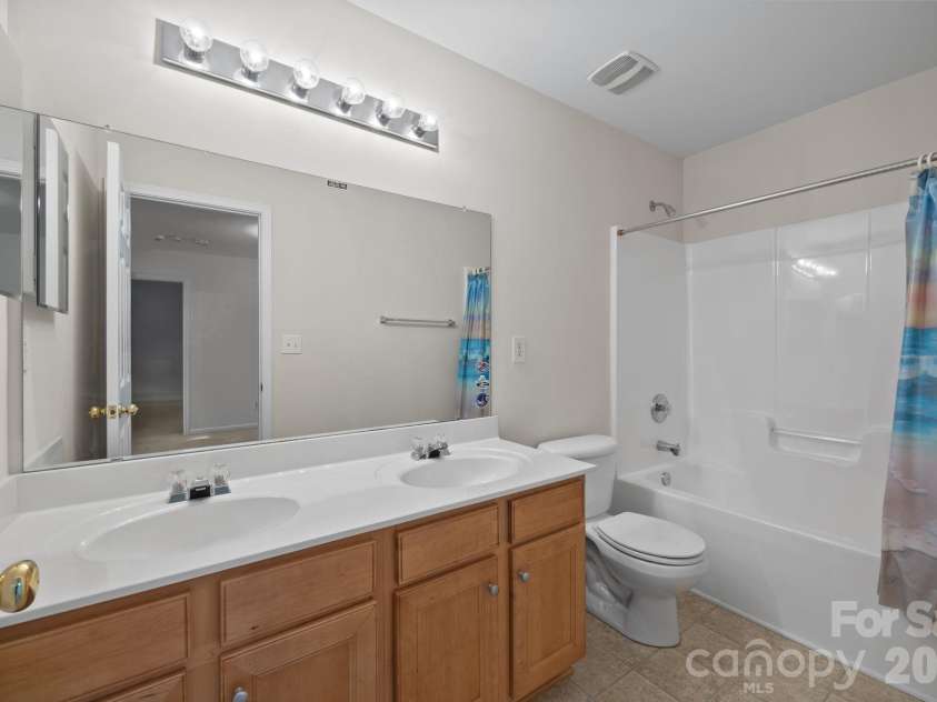 14307 O Casey Lane, Charlotte, NC 28213.  MLS# CAR4355673, YatesRealty ID 12501. Secondary Bathroom with dual vanities Upper Level